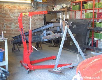 Engine hoist used to lift chassis 