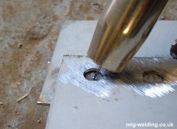 Welding torch position for plug weld