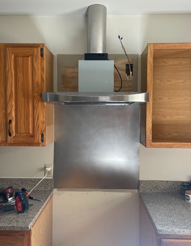 backsplash-and-hood-installation-in-progress-smaller-image.jpg
