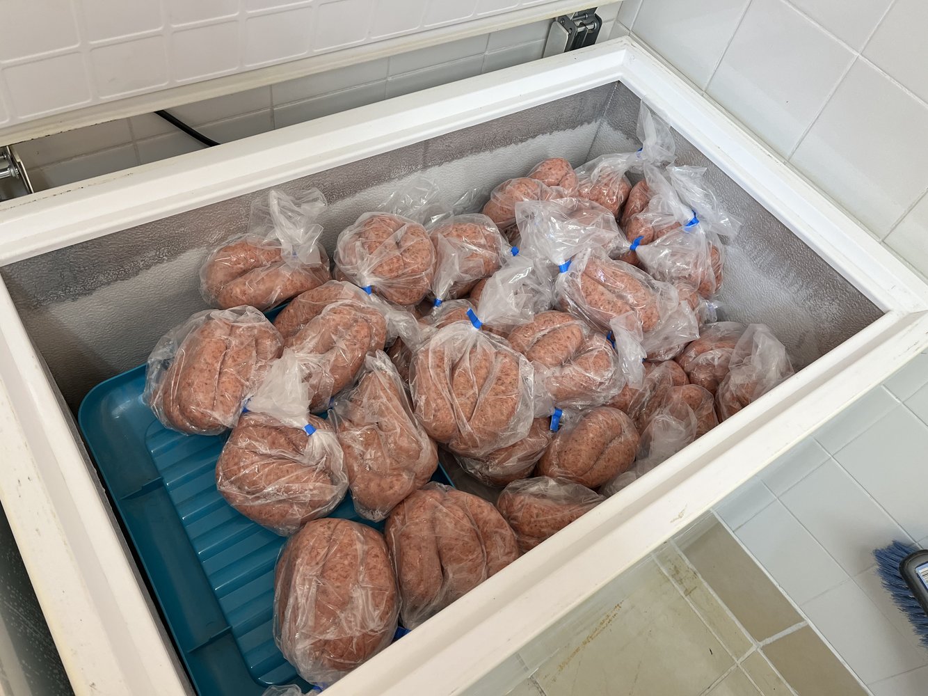 Chest-Freezer-Full-Of-Sausages-And-Burgers.JPG