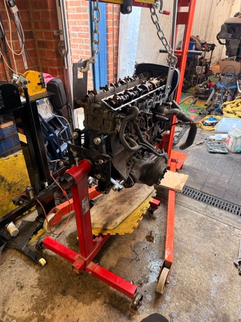 engine on crane and stand.jpeg