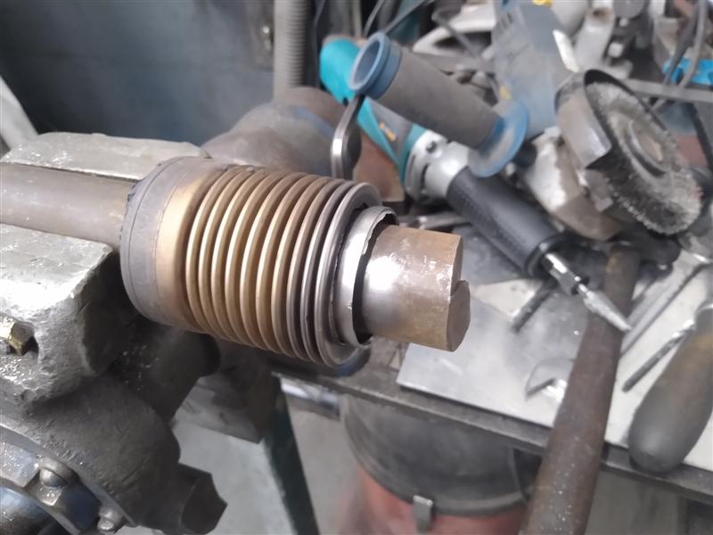 Welding up rotted exhaust flexijoint bellows. MIG Welding Forum