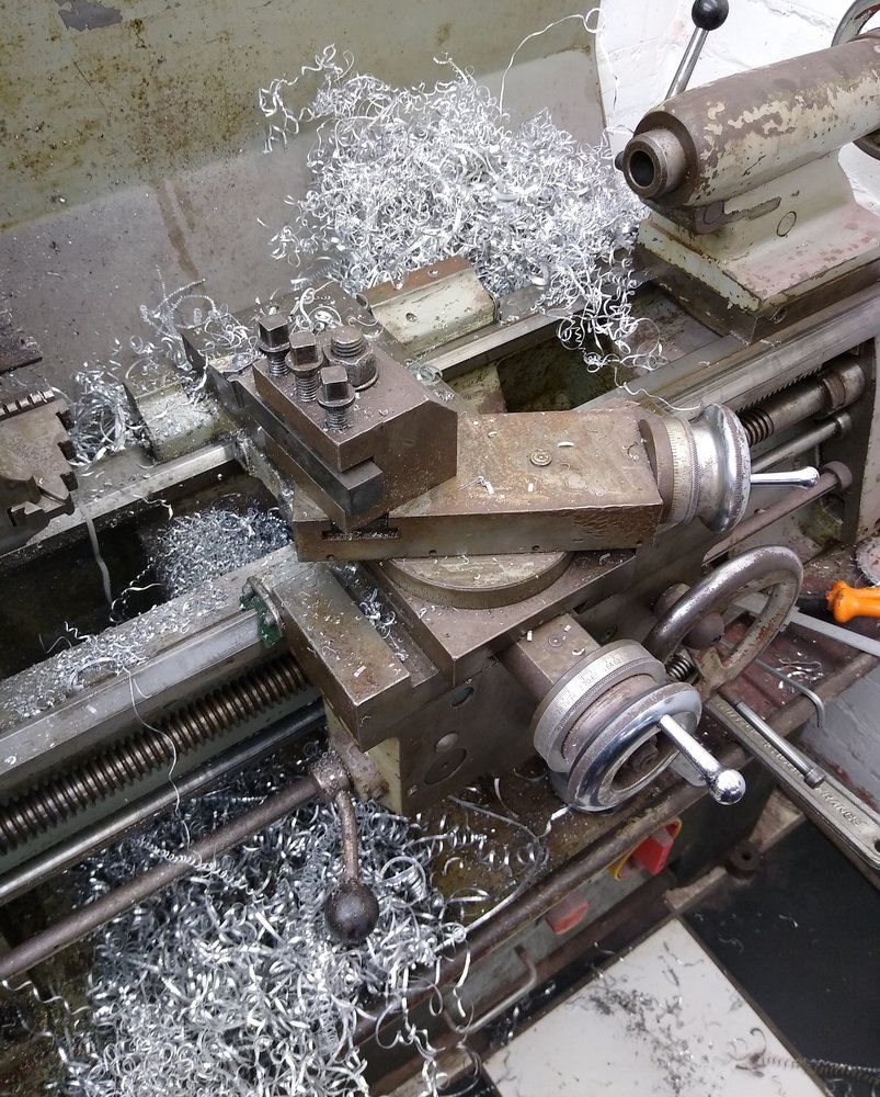 lathe mess after maching thermo housing.jpg