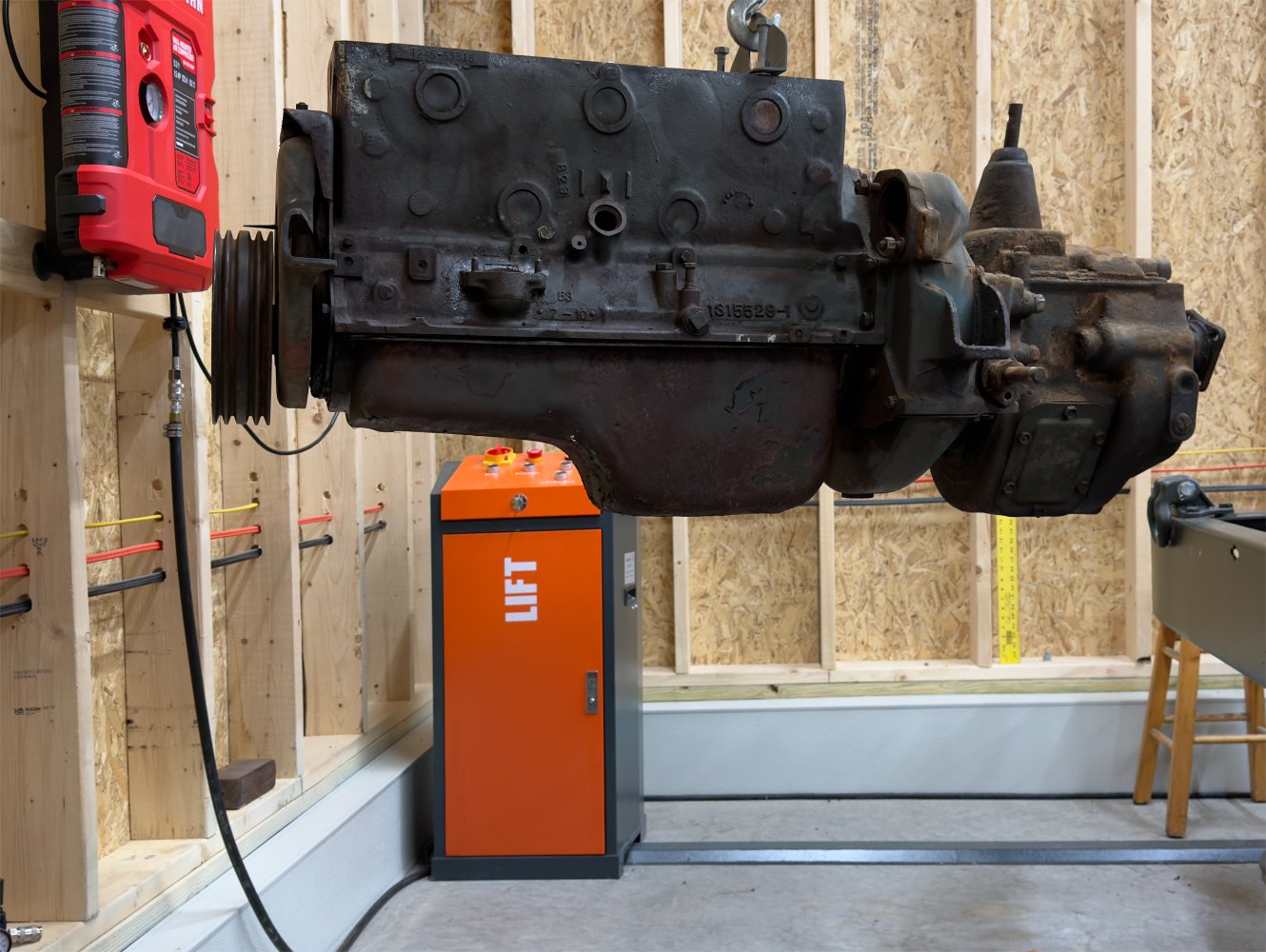 M37-engine-suspended-from-engine-hoist-smaller-image.jpg