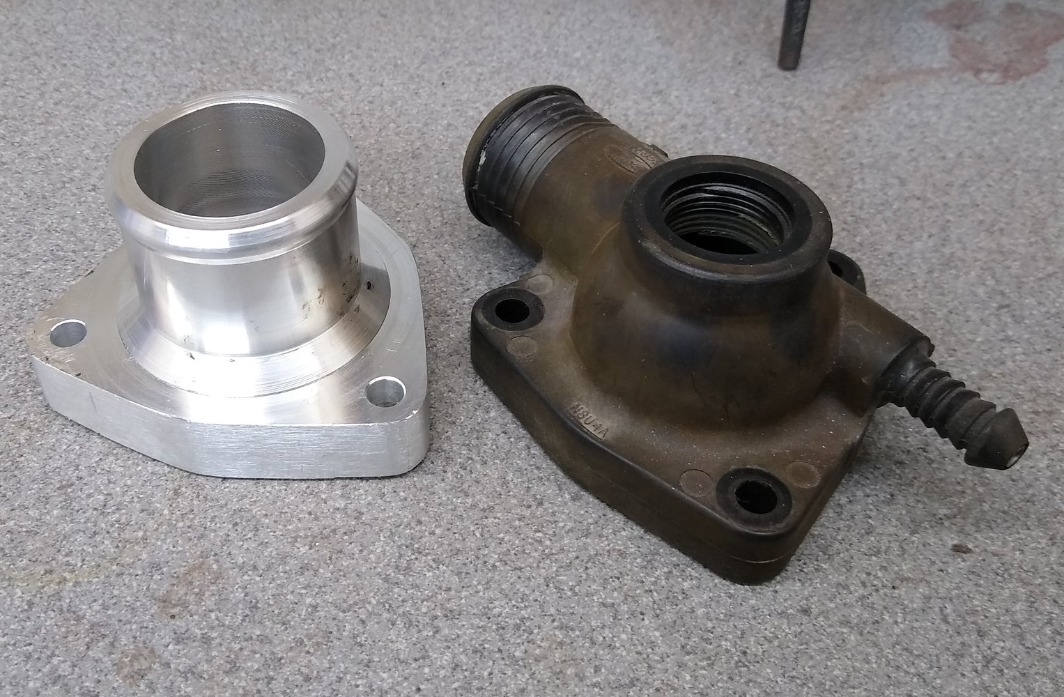 original and copy thermostat housing.jpg