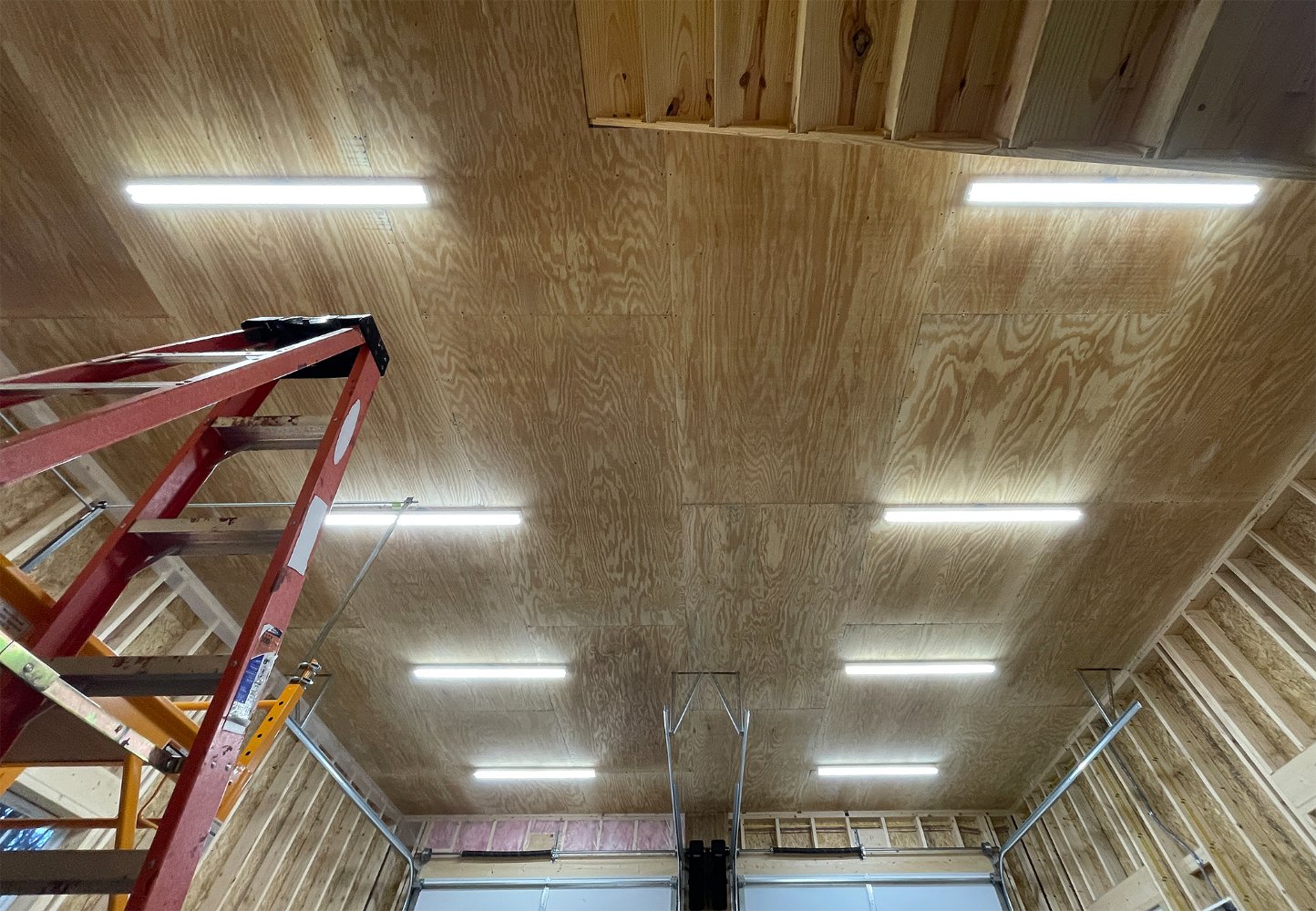 plywood-and-lights-on-garage-ceiling-smaller-image.jpg