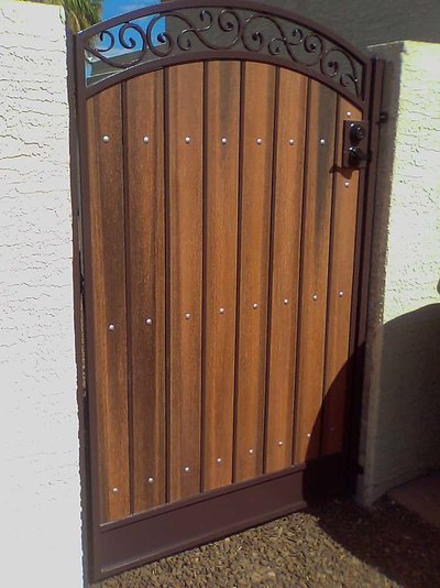 arched-pedestrian-gate-with-kickplate-and-redwood.jpg