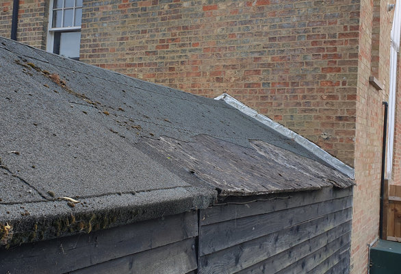 roofing-felt-broken.jpg