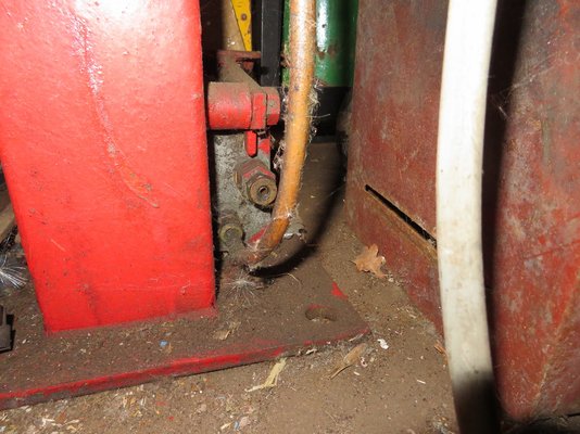 cylinder foot pedal lowering block.jpg