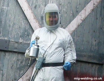 Paint overalls and air fed mask