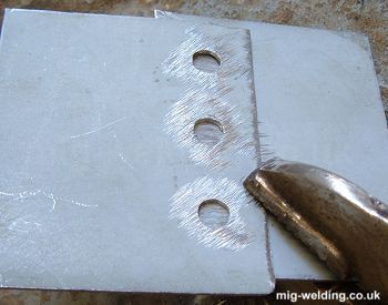 Steel drilled for plug welding