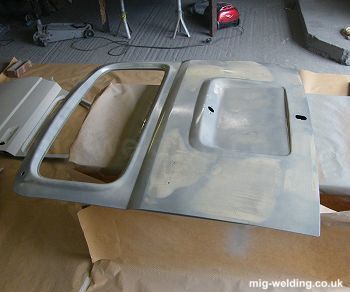 Light mist coat of primer on bare metal