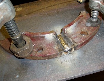 Root weld in cast iron flange